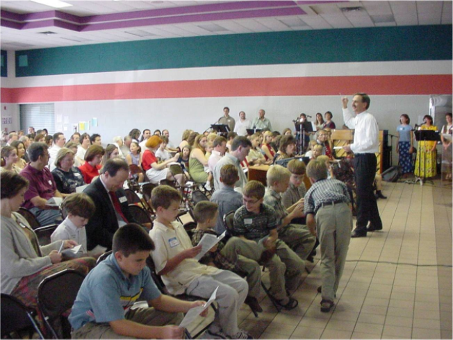 Sunday morning worship moved to Brookhollow Elementary in Pflugerville as attendance grew.