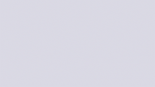 The image shows a plain, light purple background with no distinguishable objects or features.