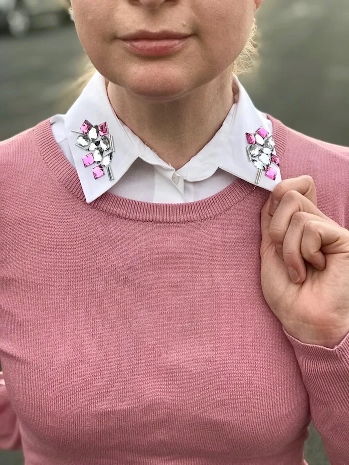 pink sweater with embellished collar