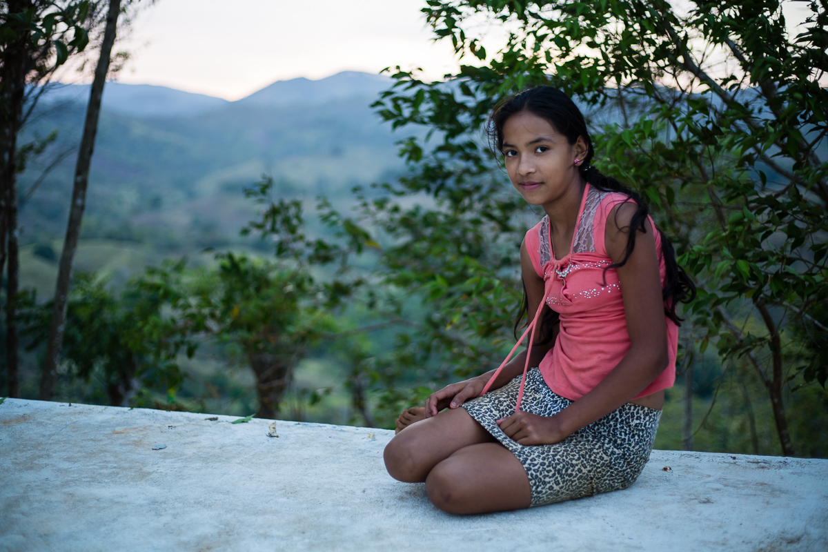 2019. Tani sits atop the latest infrastructure project, an aqueduct, which provides running water 2 days a week. Prior to its installation, water was carried from the many rock springs throughout the hillsides.