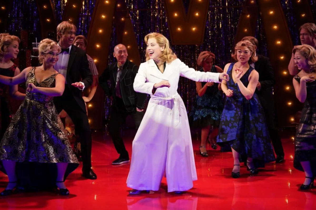 Alyse Alan Louis, as Hillary Clinton in the Public Theatre production of SOFT POWER by David Henry Hwang.