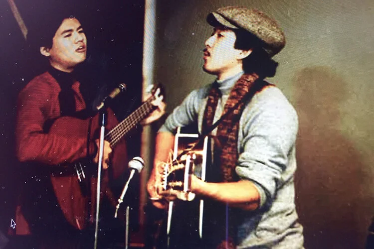 Philip Kan Gotanda (right) performing his original music in 1979 with David Hwang. (Photo courtesy of Philip Kan Gotanda, copyright Diane Takei 2021)