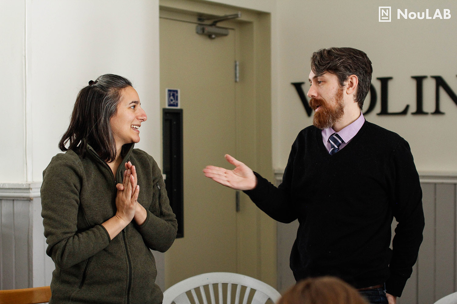 Bethany Deshpande and Nic Clement role play a prototype for resolving a conflict of interest.