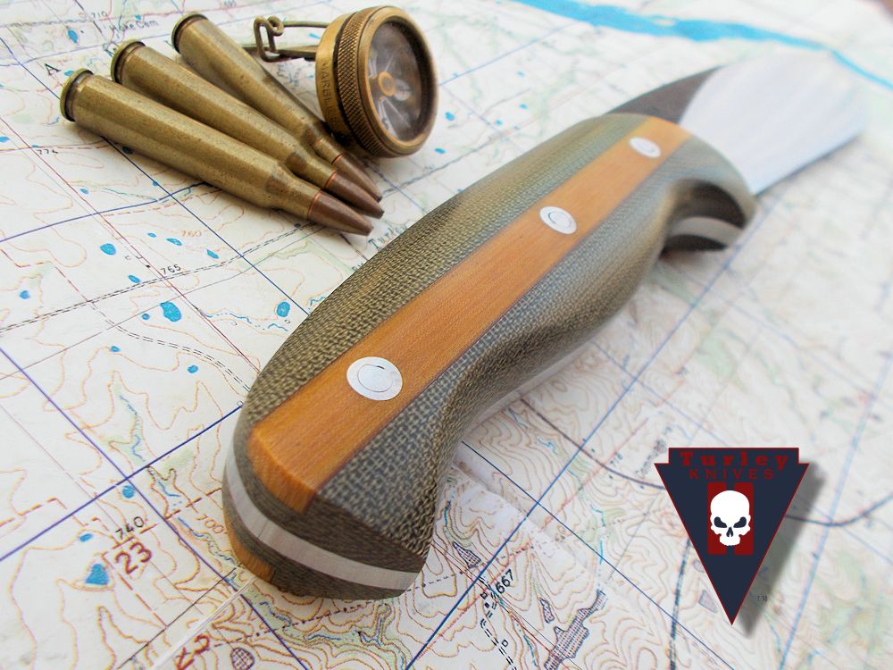 This knife has OD green micarta scales with a Natural linen micarta Fleetside option. 
