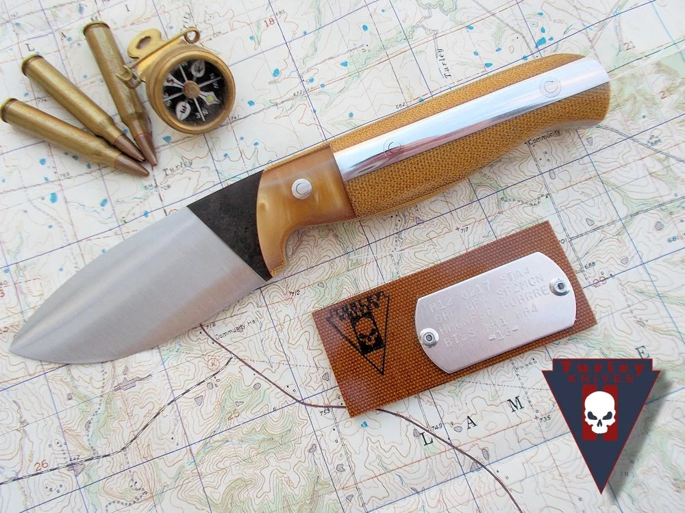 M12 with full height grind, butterscotch resin bolsters, 1/8" natural micarta spacers, natural canvas micarta scales, fleetside deluxe option-aluminum and stainless loveless bolts. 