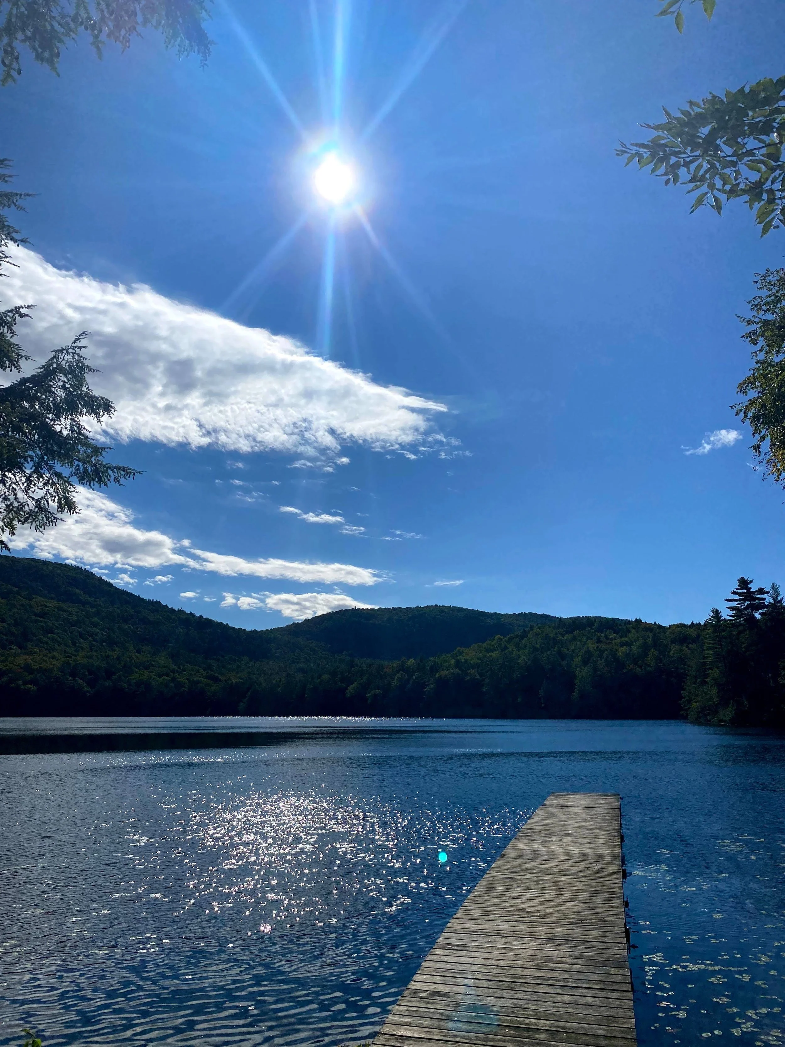 Sun over the lake at Tall Timbers Dock (Copy)