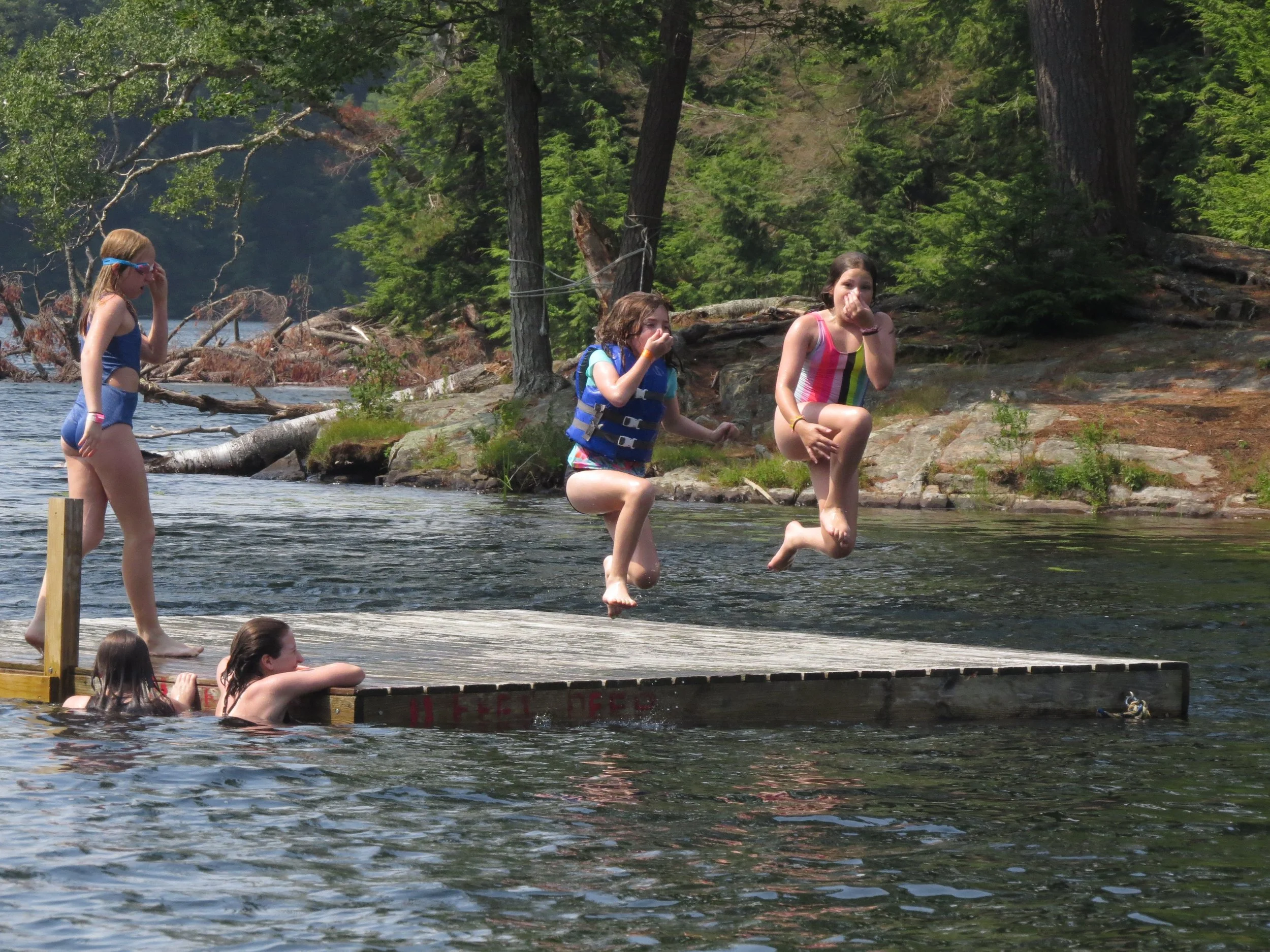 swimmers jumping from dock.JPG