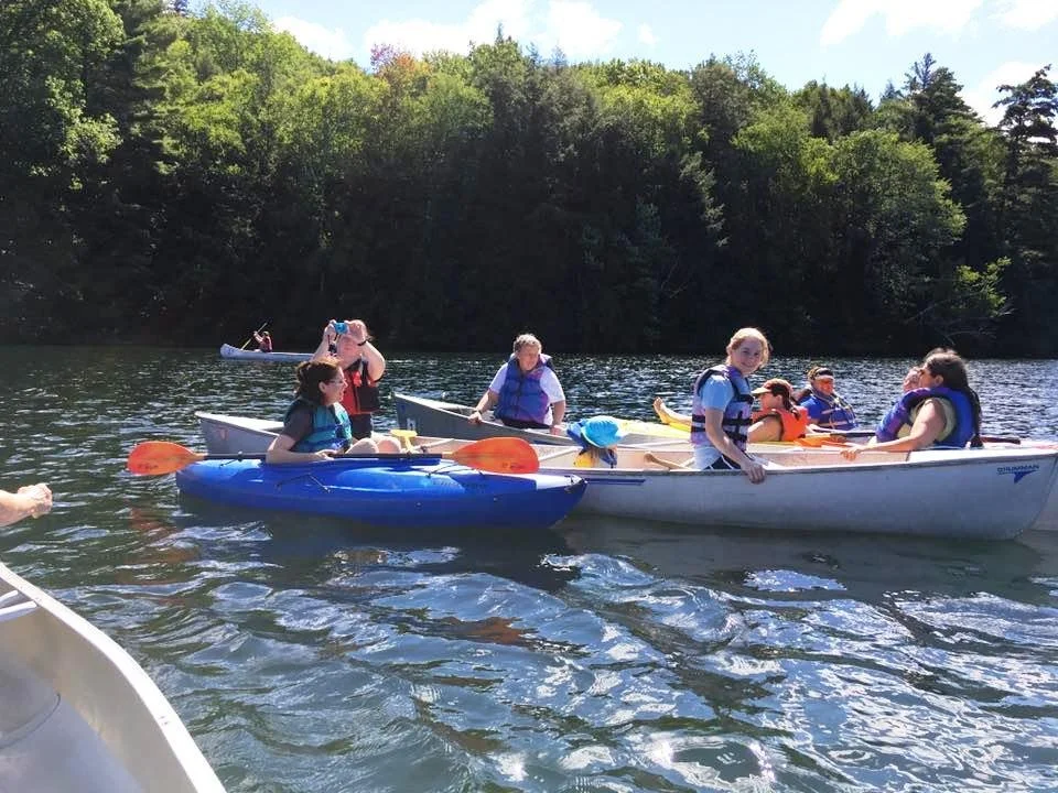 friends kayaking and canoeing