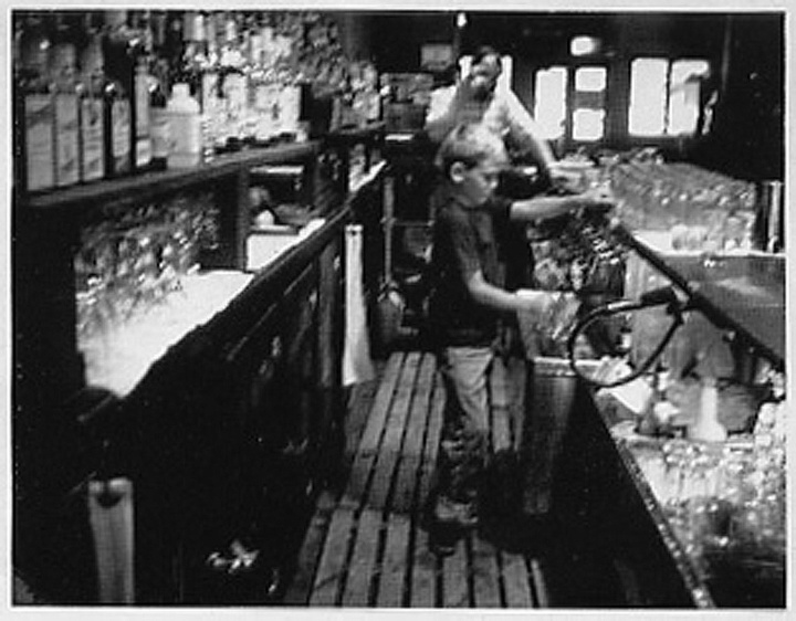 Danny as a boy, working in his father's bar