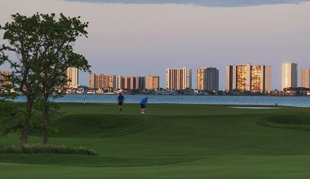 Some golfing at @lighthousesound during warmer times. A glowing @oceancitymaryland in the background.