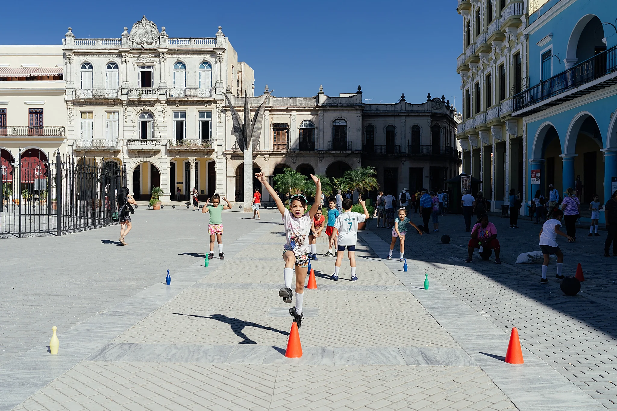 School children have gym class in the Plaza Vieja in Havana Cuba