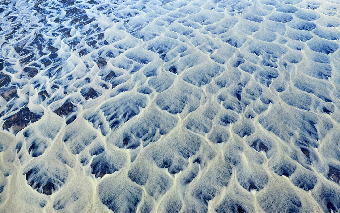 iceland-river-aerial-by-andre-ermolaev-leaves.jpg