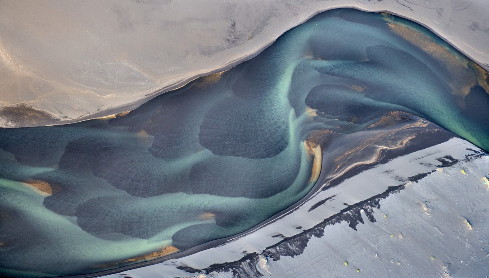 petals-volcanic-river-iceland-andre-ermolaev.jpg