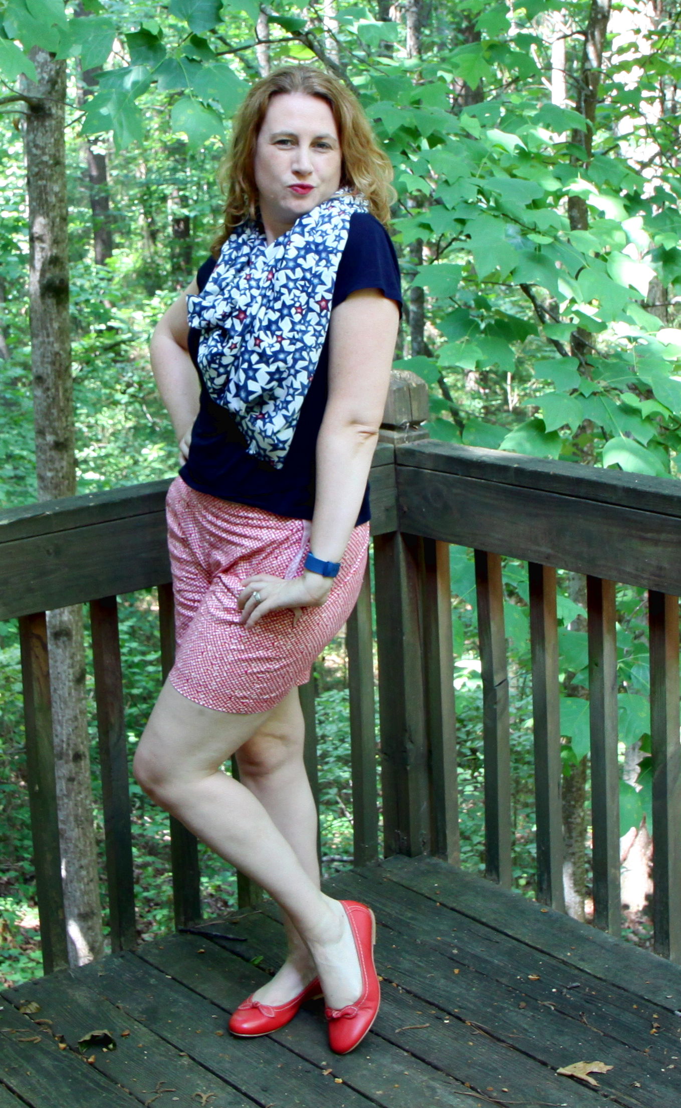 Two prints with different main colors, textures, and print size. Outfit: KRIS TOP, PICNIC SHORT, STAR PRINT SCARF , AND THE BOW BALLET FLATS
