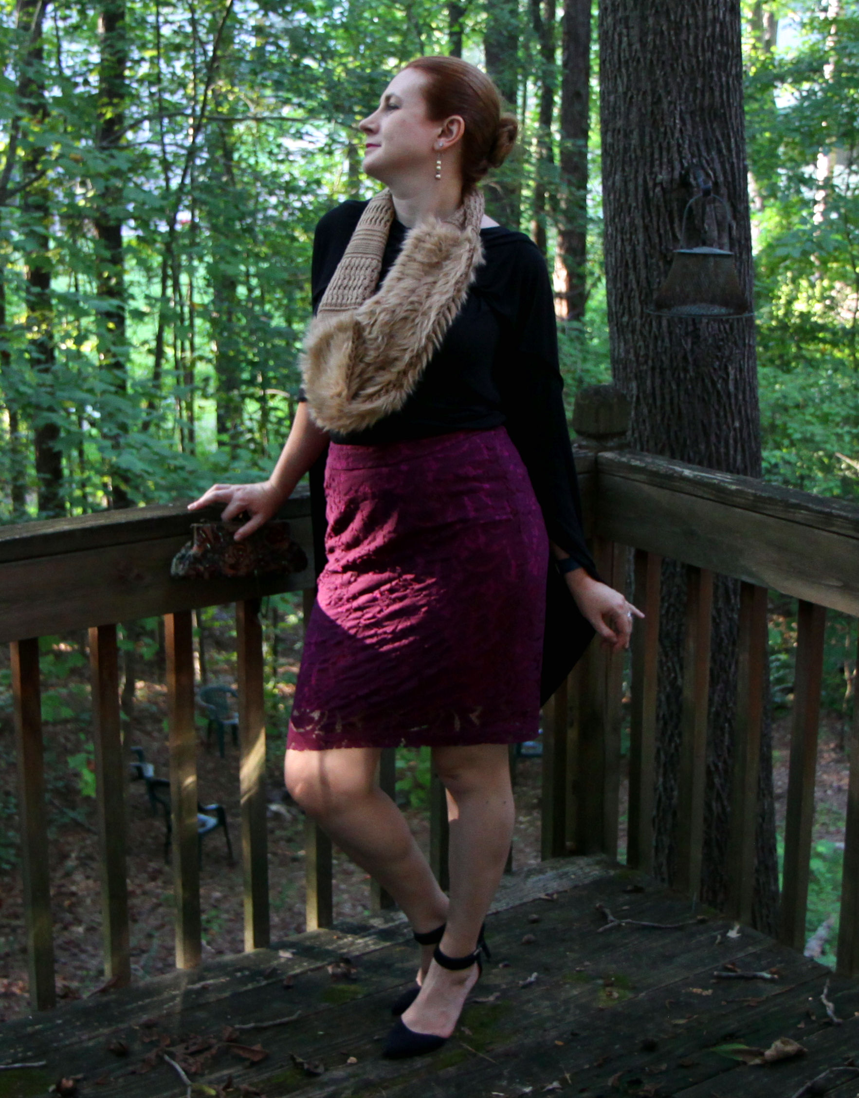 From the front: Panels draped over shoulders and then tied