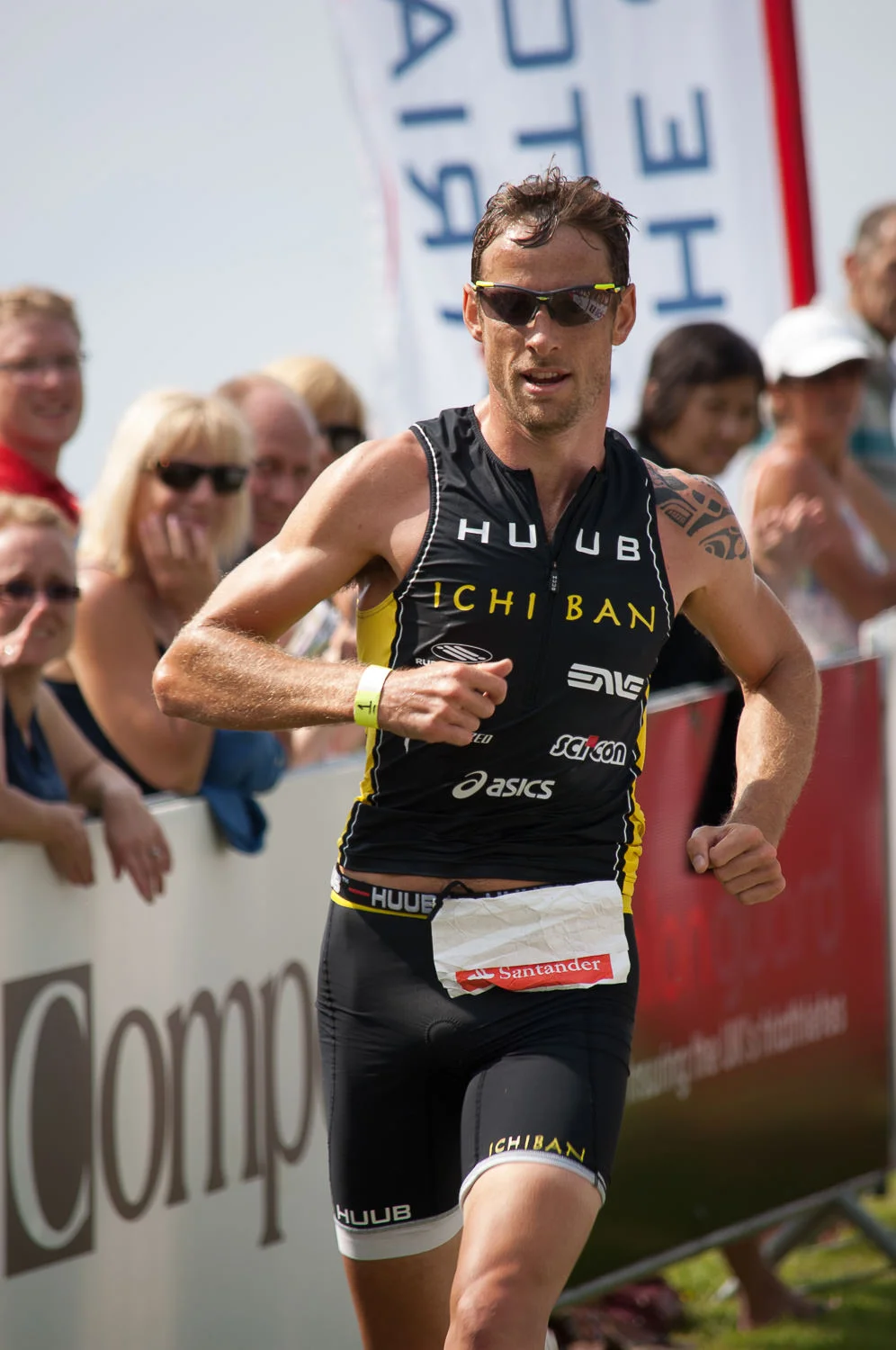Jenson Button finishes his triathlon
