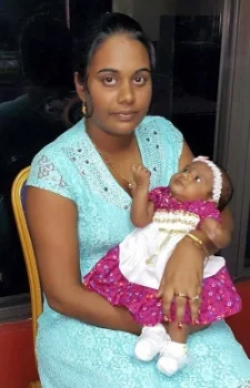 Samantha and her newborn Isabella after treatment.