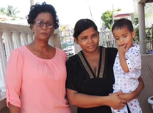 Leaving Guyana 12/15/16 Omkar with mom and Lead Volunteer, Sita Sugrim