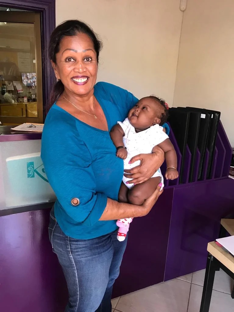 Baby Jahziah with SHEA’s Lead Volunteer, Sita Sugrim