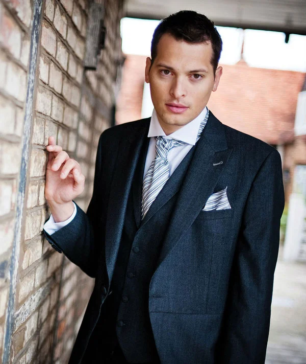 Charcoal wool & silk mix 3 piece Tails. Hire package from £120. Hire package includes Jacket, Trousers, waistcoat, shirt, neckwear, handkerchief & accidental insurance.