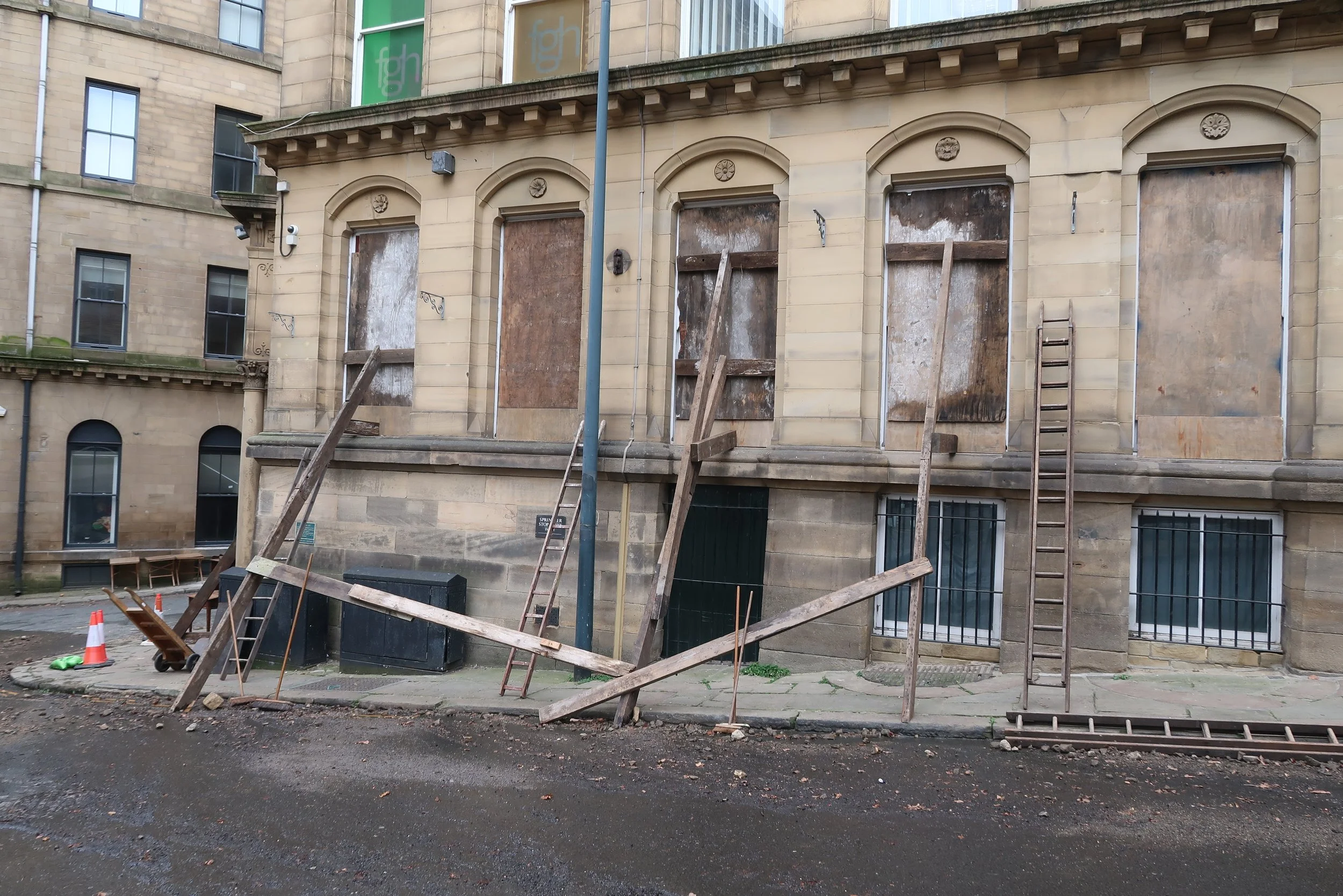  Bomb damage - Timber struts and boarded up windows. 