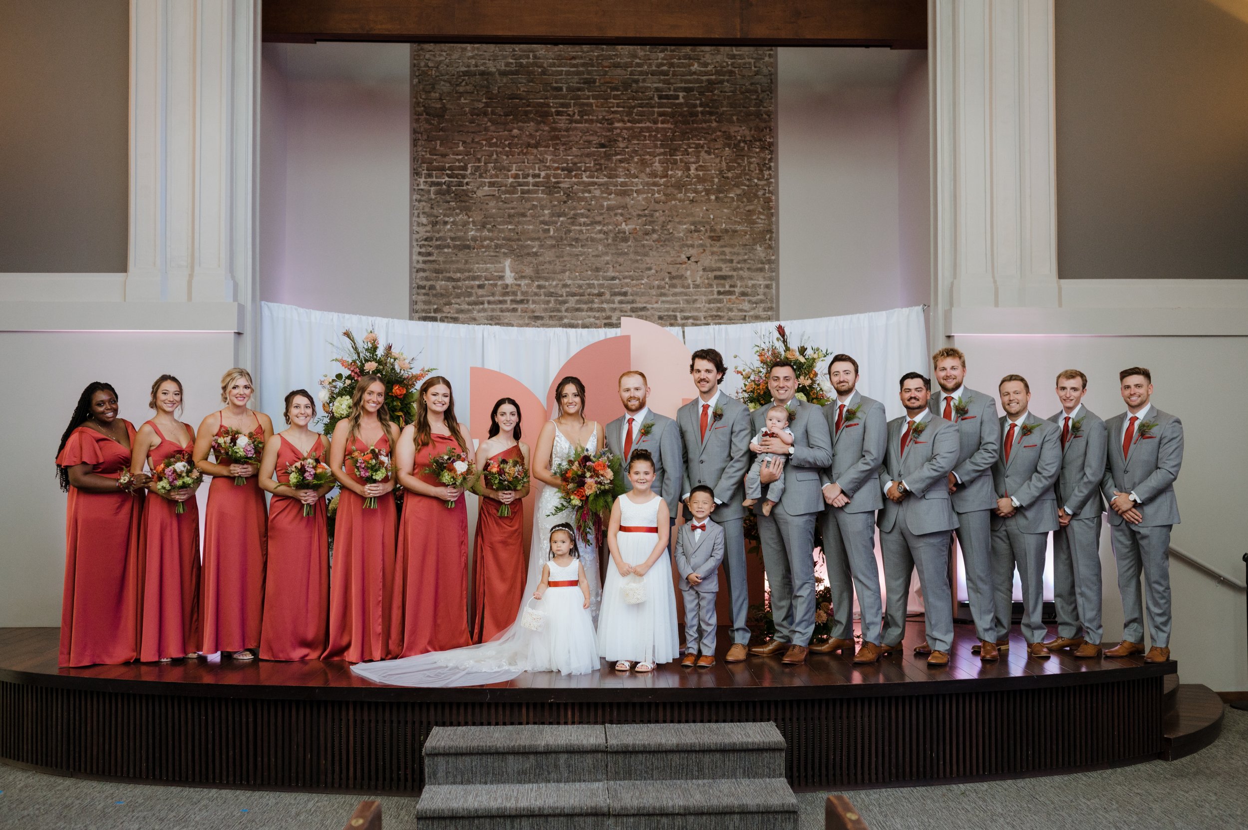  Taylor Atkinson Photography captured Cera’s and Dylan’s Fall wedding at the Omaha Palazzo perfectly! So many candid shots of their love, joy, and comradeship between their family and friends, along with the beautiful floral and natural ambiance of t