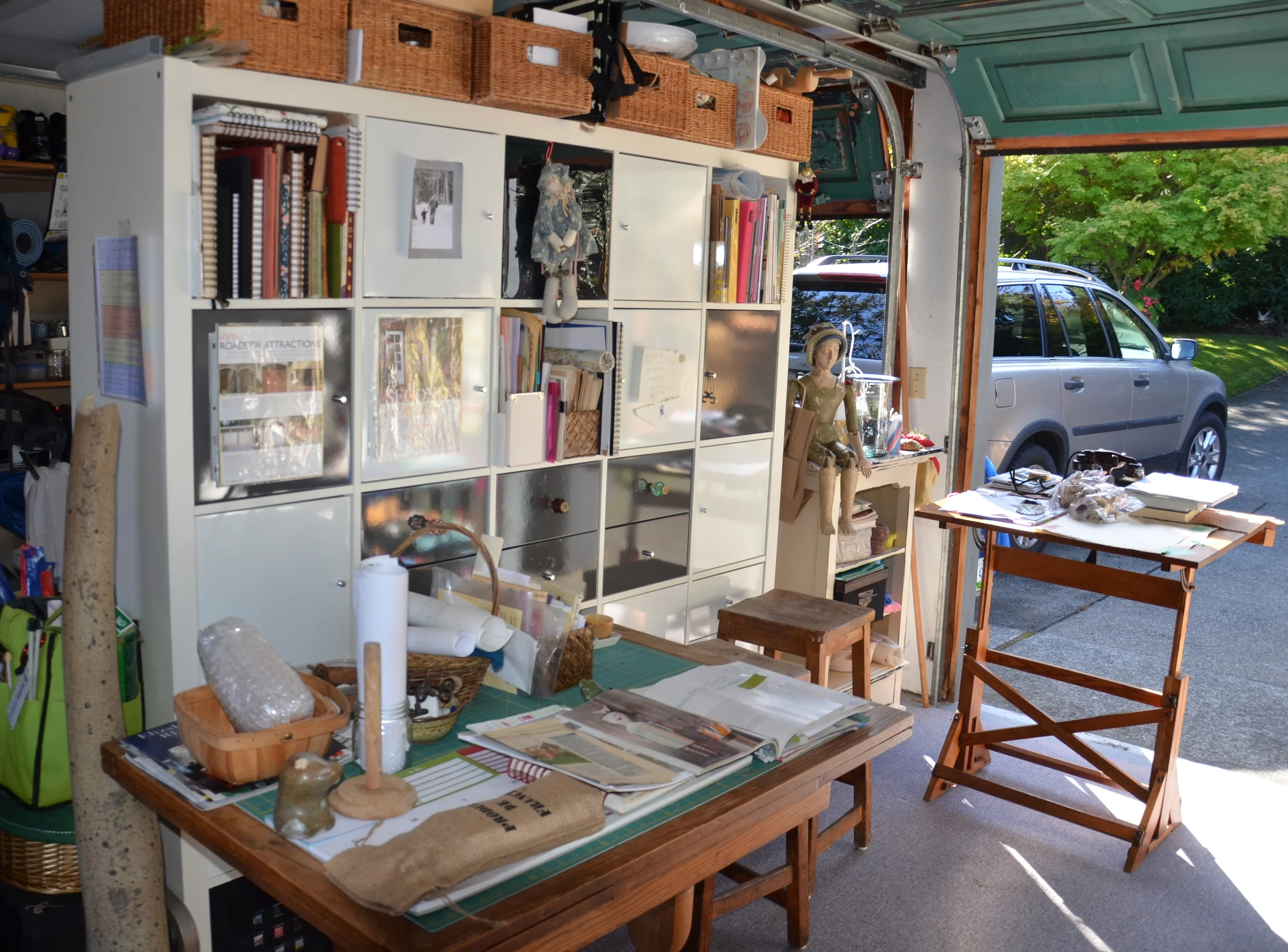 My dad’s old drafting table from his university days in the 1940″s and an antique Parson’s Table my parents used as their kitchen table served to round out the feeling of familiar items that make it feel like ME .
