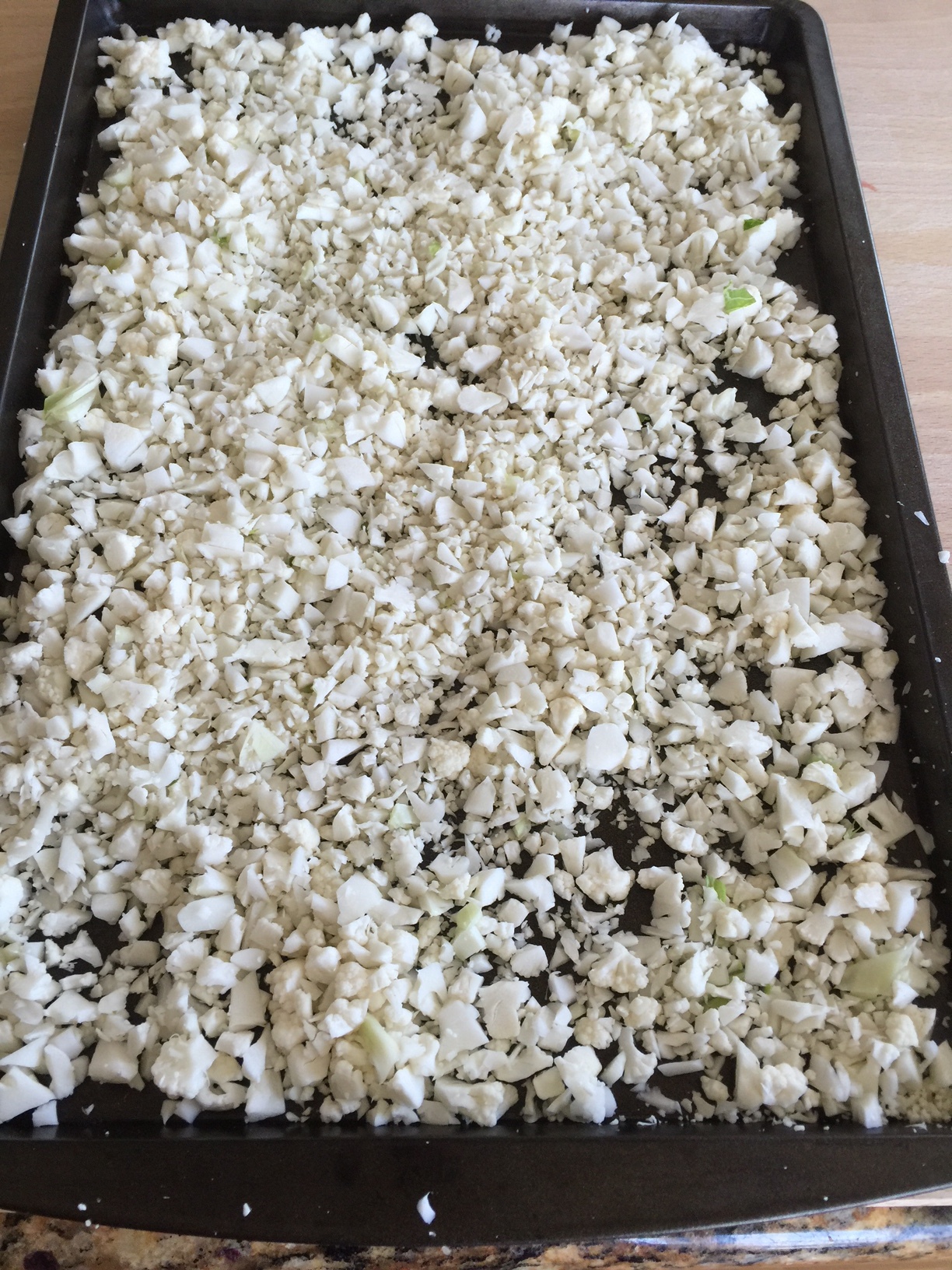 Cauliflower crumbles before being baked. 