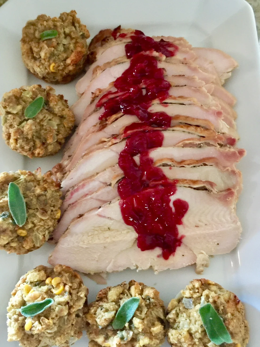 Brined turkey breast (see Meats) with sauce and Corn Stuffing Muffins.
