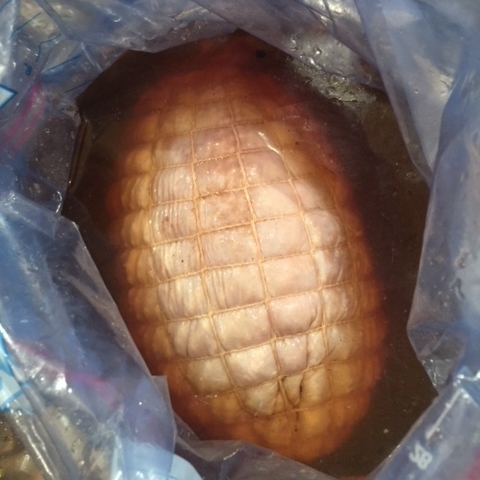 Here is the roast in a bag filled with the marinade. The turkey floats to the top.