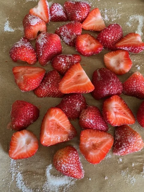 Put halved berries on foil-lined rimmed baking sheet.