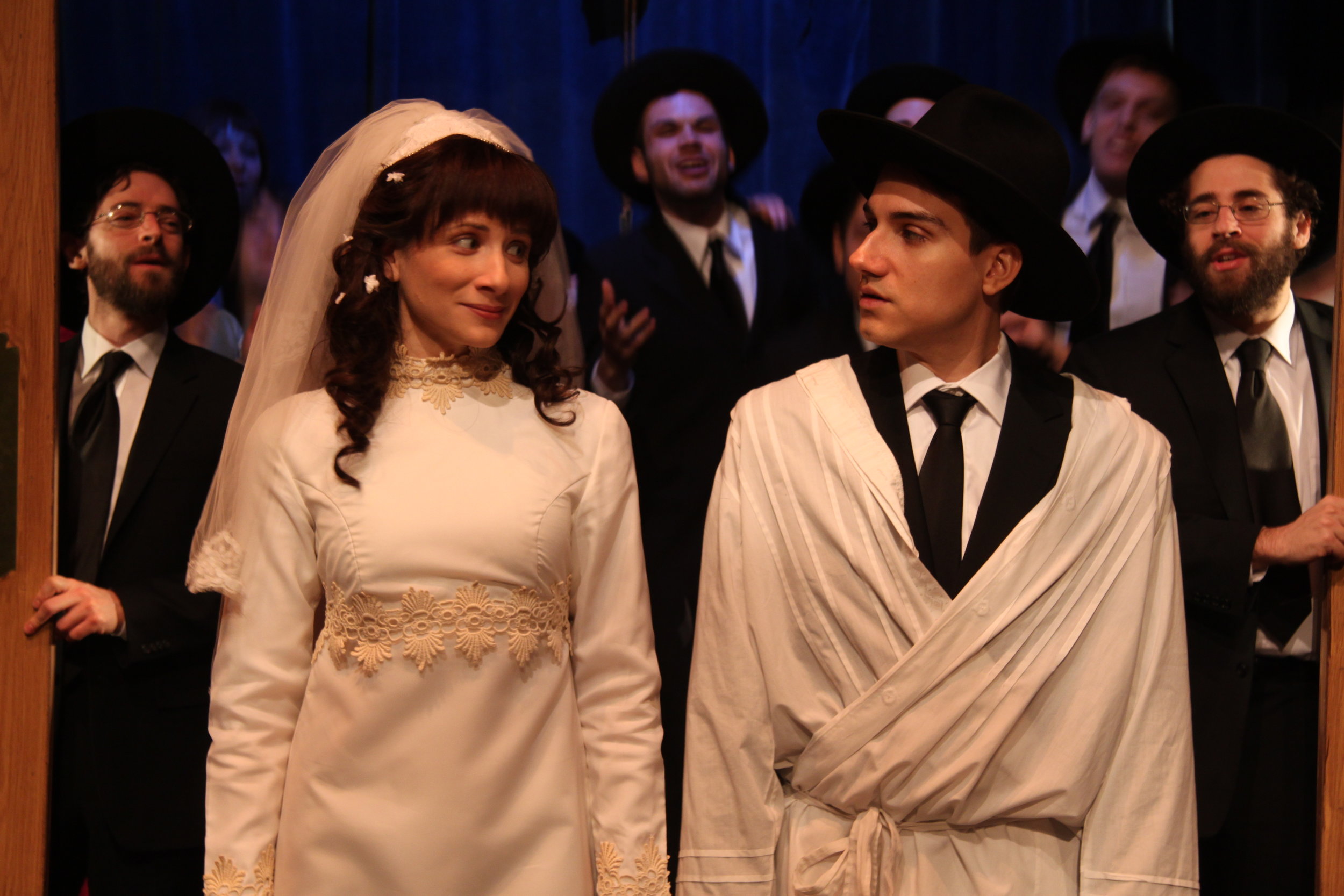  Julie Tepperman as Rachel and Aaron Willis as Chaim with members of the Cast in YICHUD (Seclusion)  