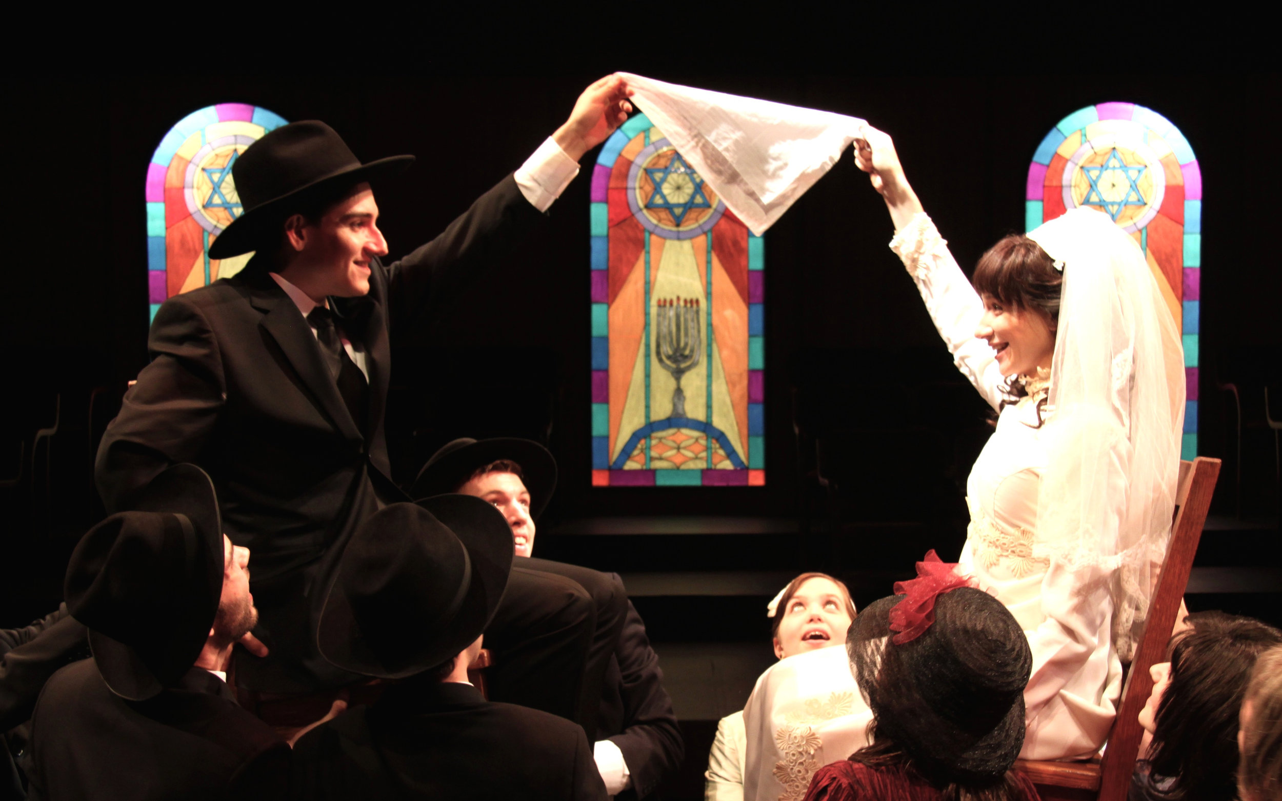  Julie Tepperman as Rachel and Aaron Willis as Chaim with members of the Chorus in YICHUD (Seclusion) 