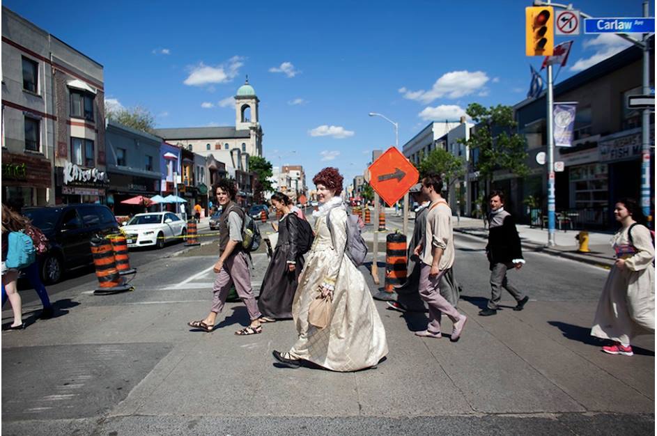  Members of the Passion Play Cast walking across The Danforth from Withrow Park (after the dress rehearsal of Part One) to East Minster United Church for Parts Two &amp; Three 