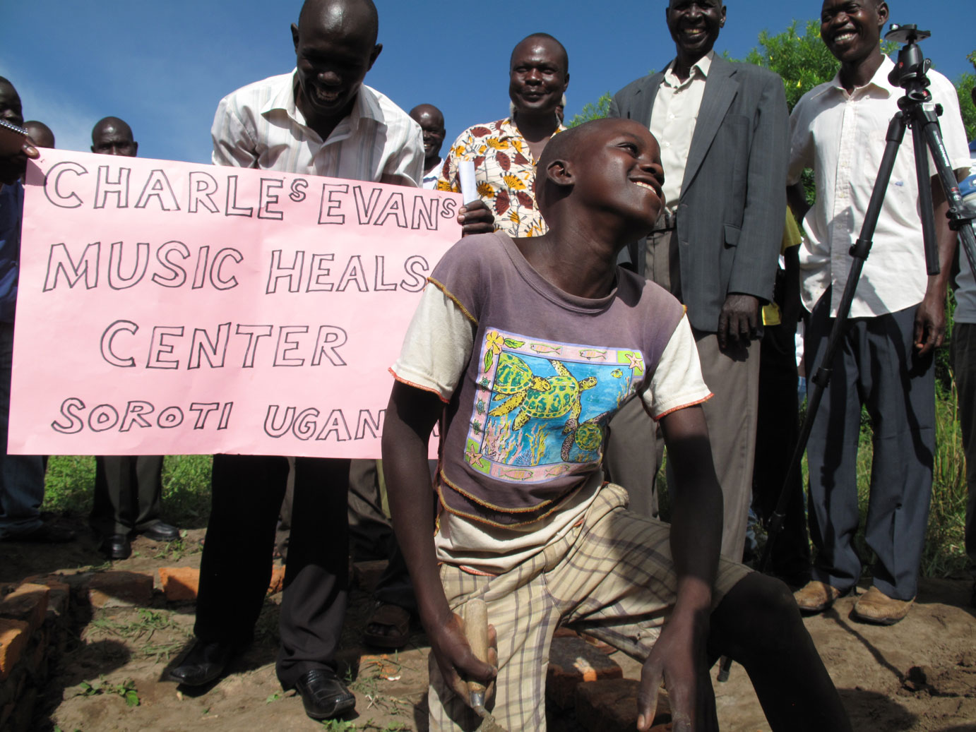 A happy village boy at the ceremony.