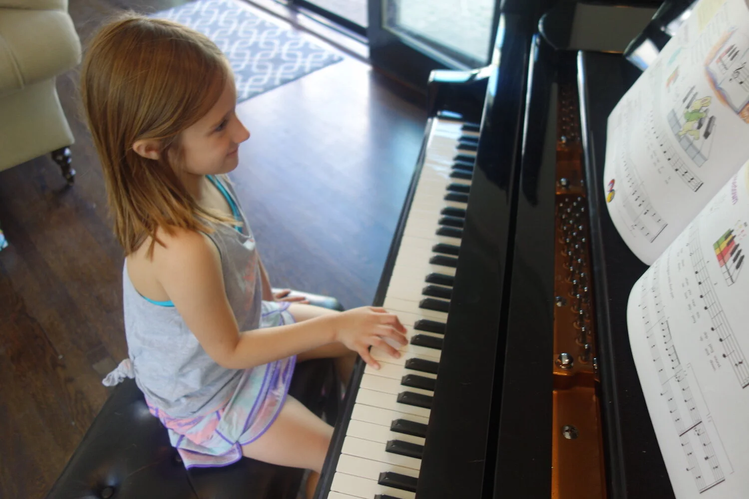 Girl Plays Piano