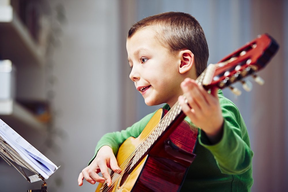 Guitar Lessons in Your Home | City Strings & Piano