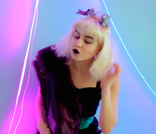 these are from the "Happy Getaways" music video which I ironically dropped after a few hours of work because my depressing industry affiliate told me to stop following my heart and that my artwork was shit and i have a zero percent chance of success. looking back, i can't believe i believed that shit. i was so far gone in my vulnerability and desperation for 'industry money and credit' that i had lost the whole point of death valentine (or whatever moniker i'll continue performing music under) altogether, one without dollar signs on top of my head and signing contracts in metaphorical blood. i had lost the very enjoyment of creating art and it was extremely hard to get it back. once i've crossed over again, i'm not the same creative entity, but i like to think that it's a better me, like a glorious phoenix rising from a pile of burning money. death valentine resurrected, again and again. 