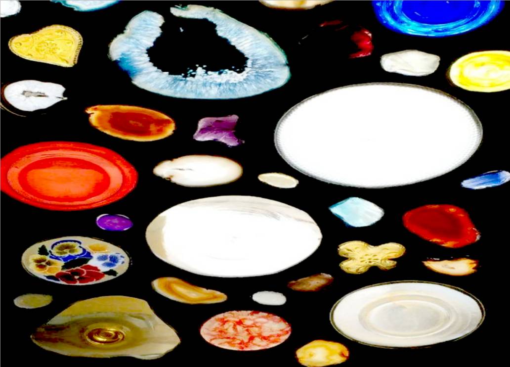 Part of a window hanging with rondels, agates, glass rocks, and other glass pieces by Jack.