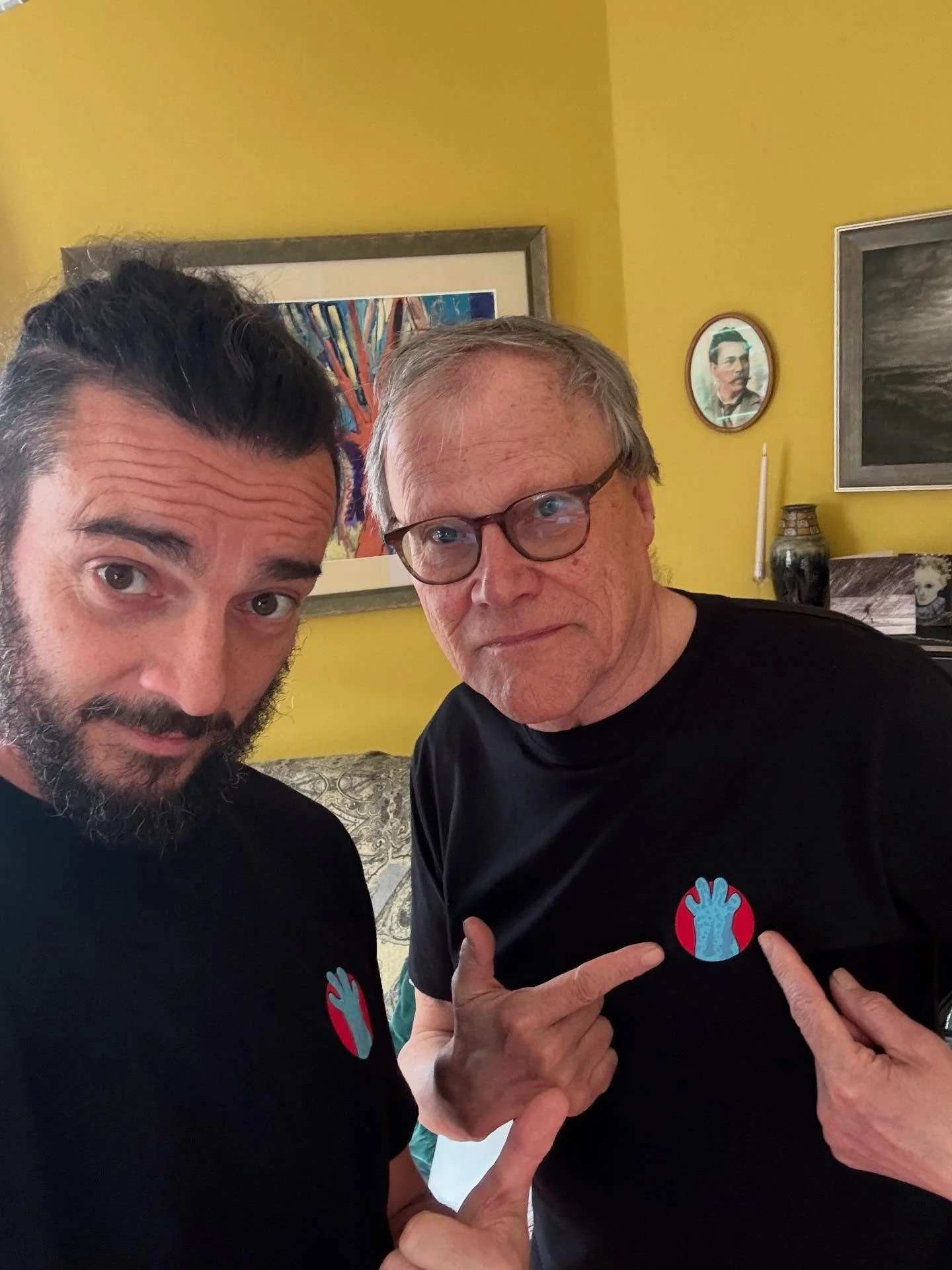 Finally it’s here! ON SALE NOW! By popular demand we have realised a black version of the super cool Sam Fanson design JGS t-shirt! LIMITED EDITION High Quality Organic Cotton T-shirt designed by designing legend Sam Fanson! A beautiful, eco-fr