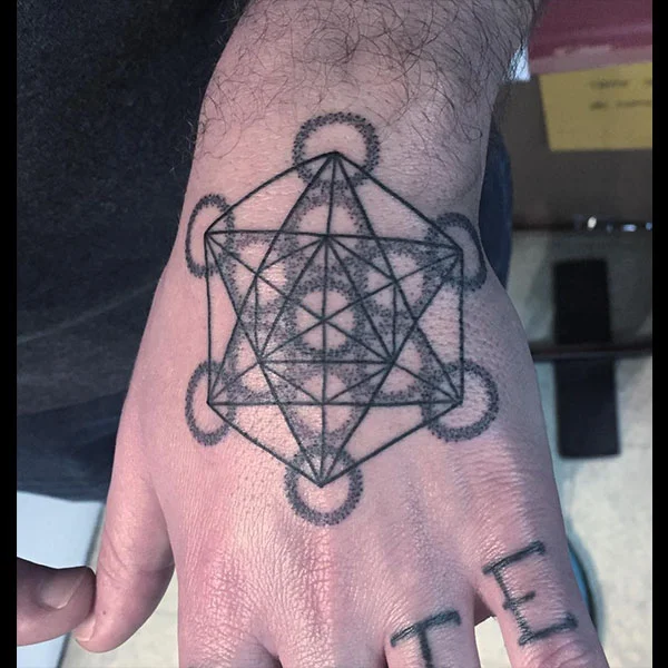 hand-sacred-tattoo.jpg