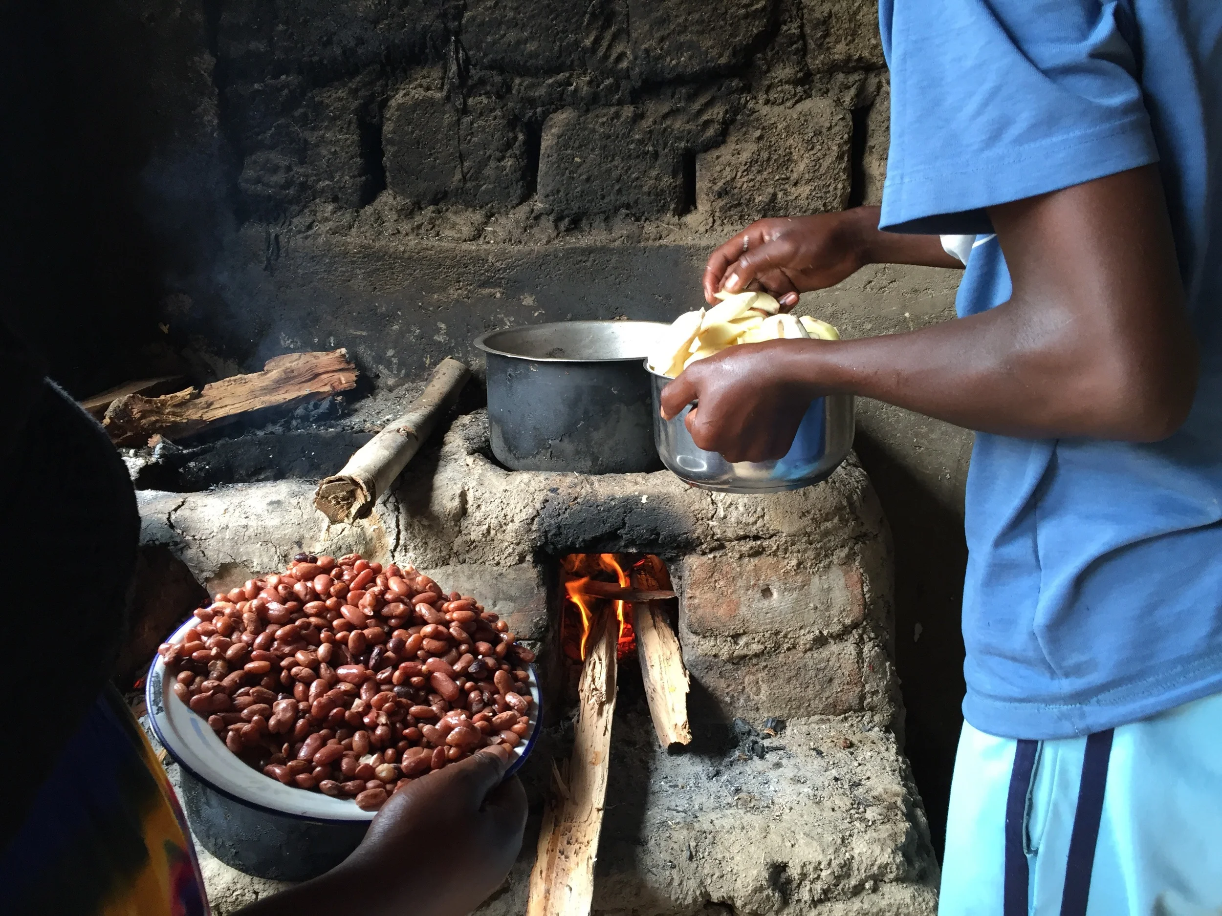 Everyone was hungry and ready for the evening meal of beans, rice, greens, fried bananas and tiny lake fish called sambaza. 