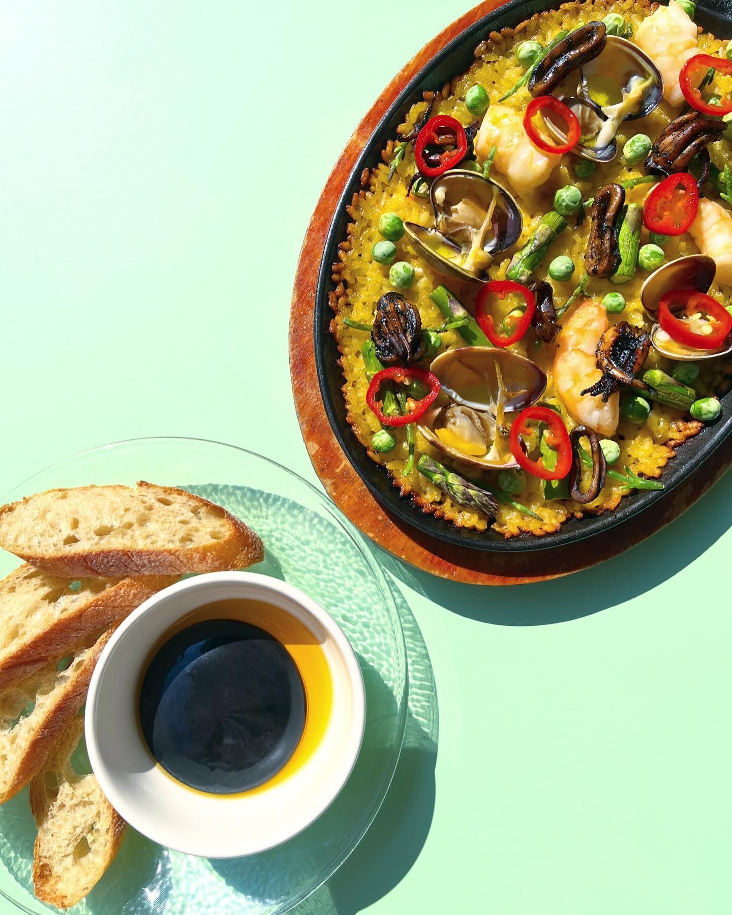 PAELLA VALENCIANA

gulf prawn ~ manila clam ~ adobong pusit ~ spring veg ~ squid ink aioli &amp; chili oil ~ bub&rsquo;s baguette

pairs beautifully with our two new blanco y tinto verm&uacute;t spritzes. 

a celebration of two cultures &amp; a way t