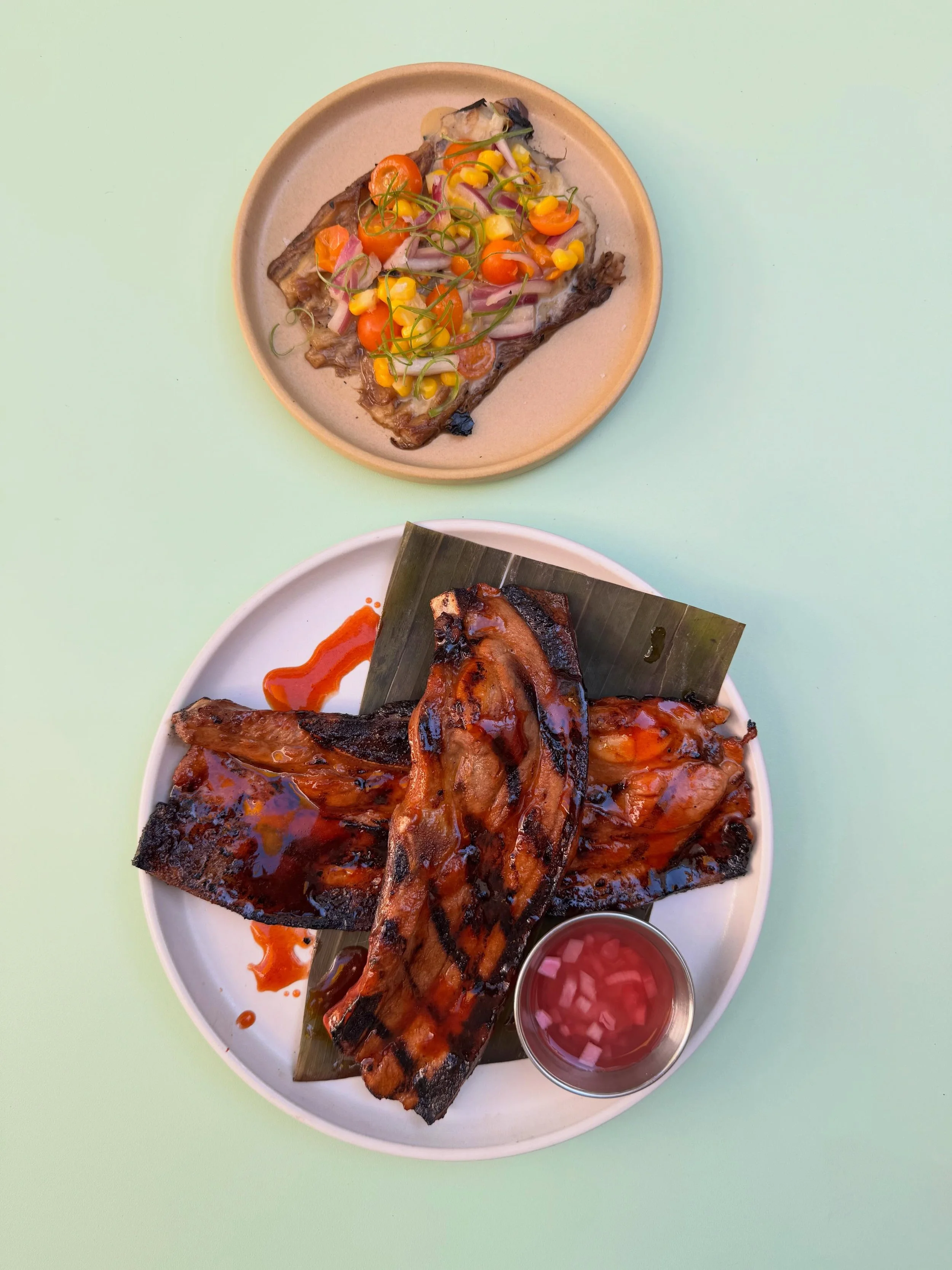 Our specials we are running tonight for snacks tracks. Inihaw Spare Rib&thinsp;
pinoy bbq glazed pork + chinese eggplant, weiser farms sungold tomatoes, corn, miso-calamansi&thinsp;
&thinsp;
&amp; &thinsp;
Inihaw Spare Rib &amp; Eggplant Salad&thinsp