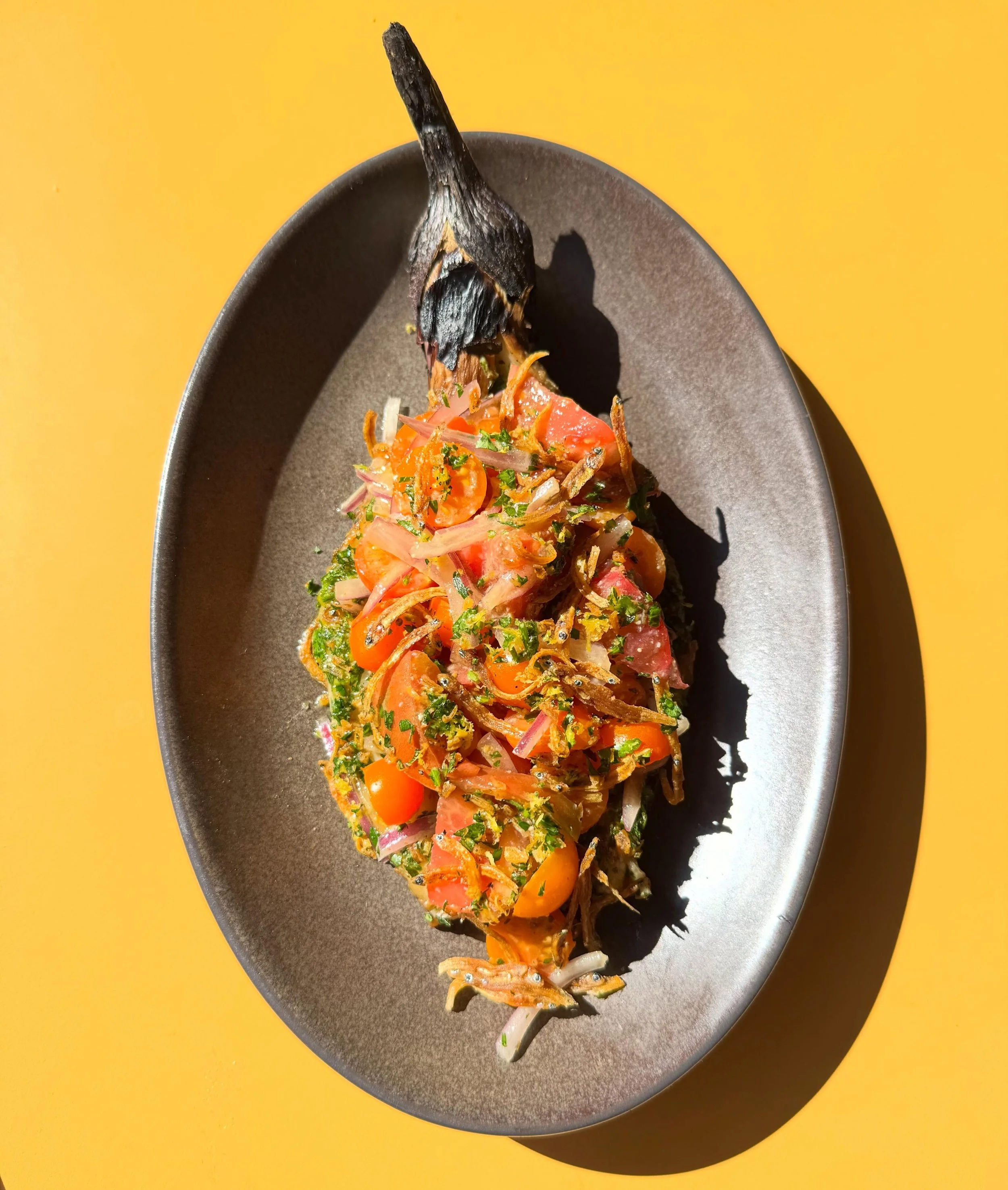 End of summer special!

EGGPLANT SALAD 

smoked eggplant ~ sungold tomato ~ dilis gremolata ~ calamansi-miso vin

reservations &amp; walk-ins welcome