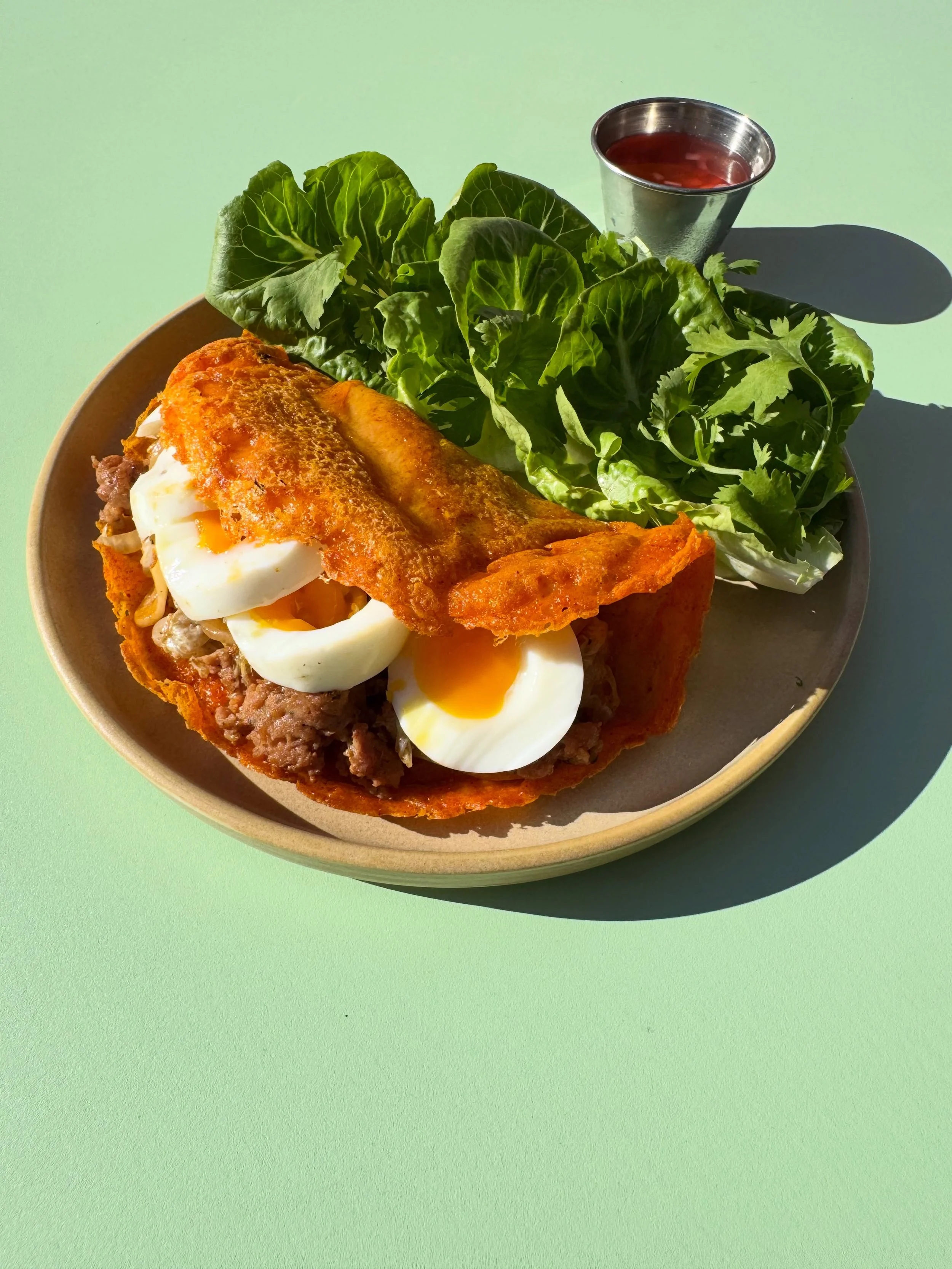 A look at our new pulutan menu starting tonight, 9/23!

Our special menu served alongside our regular dinner menu, midweek! An easy way to pop by for a bite and glass. 

ILOKO CREPE
longganisa, soft boiled egg, coconut &amp; annatto 
$16

HOUSE CHIPS