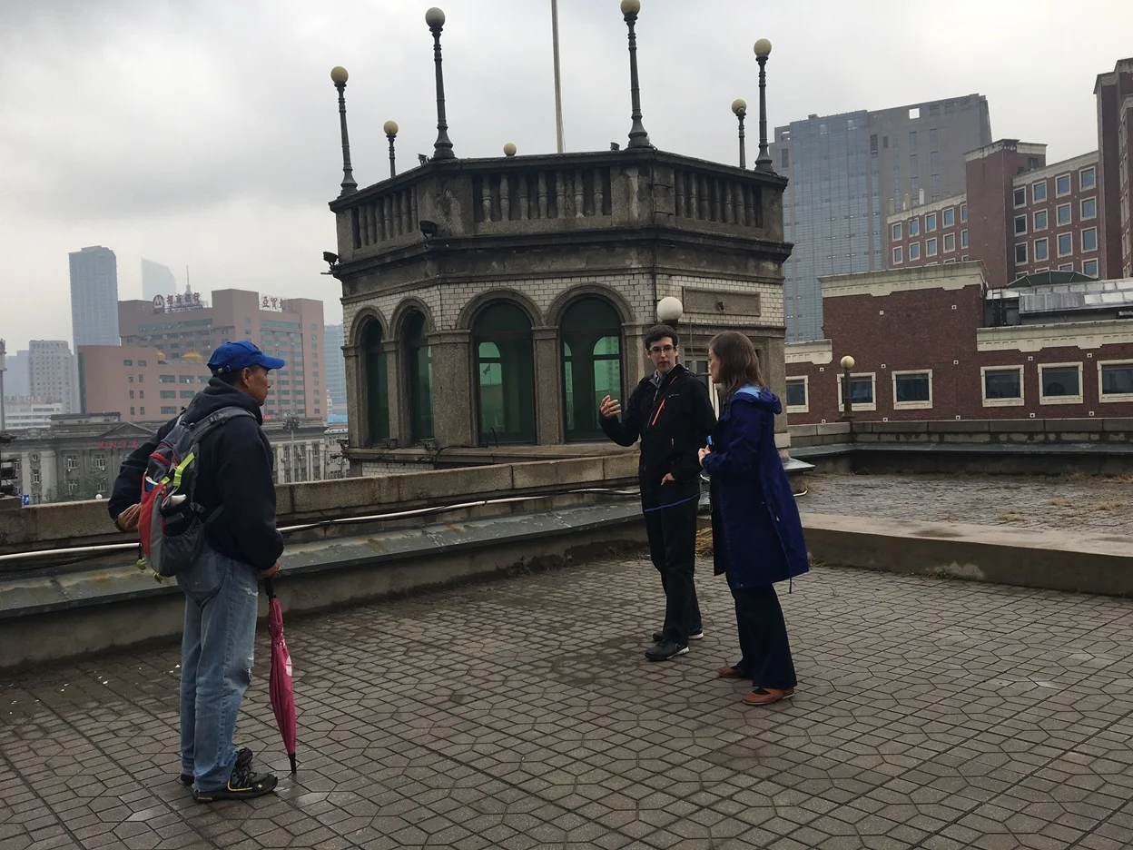 Hexi, Charles Gravelle and Sara Velas on the roof of Liaoning Hotel, May 2017 photo credit: Ruby Carlson
