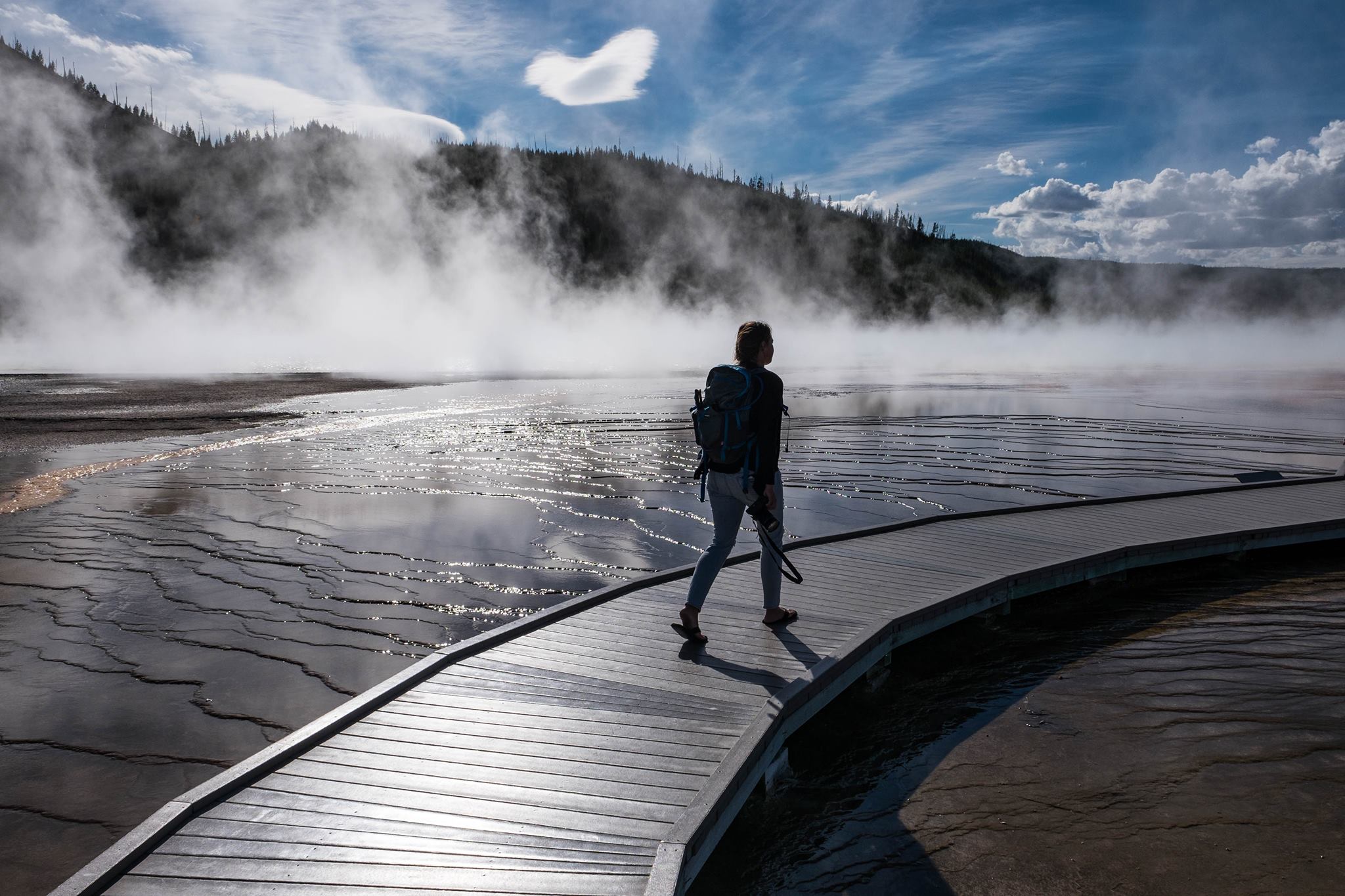 Walking through the geothermal features at Grand Prismatic Spring at Yellowstone National Park in Wyoming/Montana/Idaho