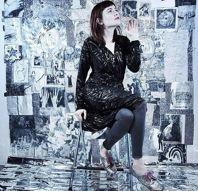The artist with her work.