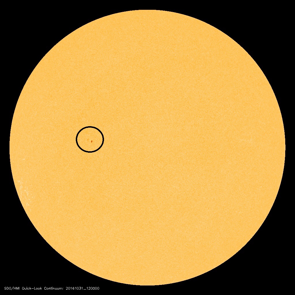 The current solar image shows one sunspot region (circled) as the sun heads toward the next minimum phase; image courtesy NASA